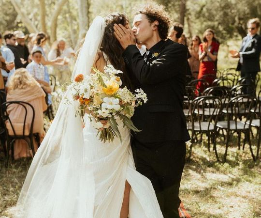 Eden Brolin and her husband Cameron Crosby kissed each other at their wedding